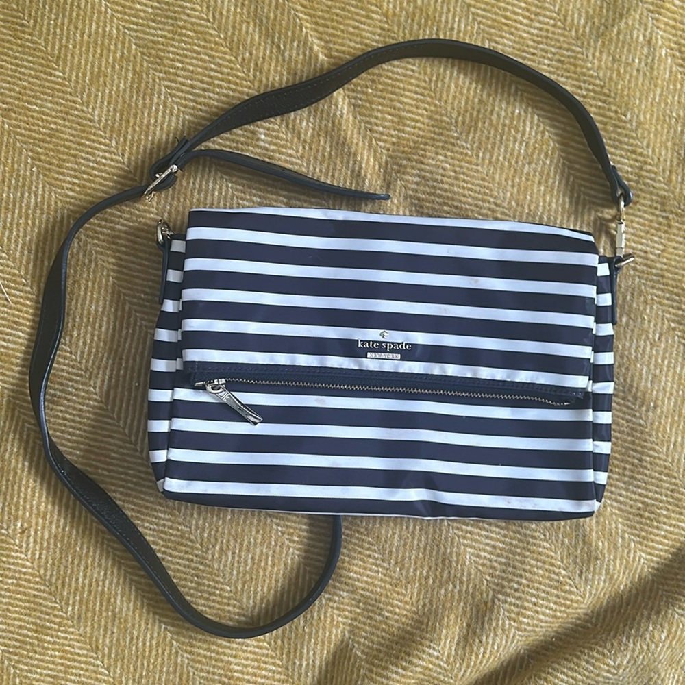 Black and white striped Kate Spade Crossbody bag.